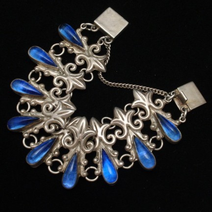 Mexico Sterling Silver Ornate Wide Fleur de Lis Links Blue Glass Stones Vintage Bracelet from myclassicjewelry.com